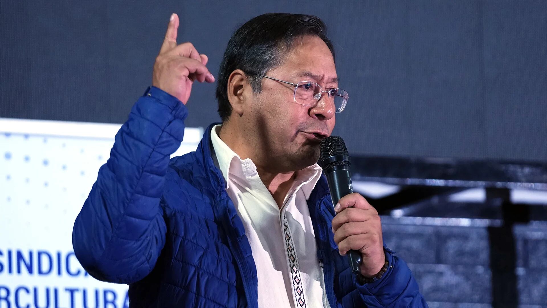 Bolivian President Luis Arce addresses a meeting of agricultural workers of the Confederation of Cultural People of Bolivia, Tuesday, Oct. 3, 2023, in La Paz.  (AP Photo/Juan Garita)