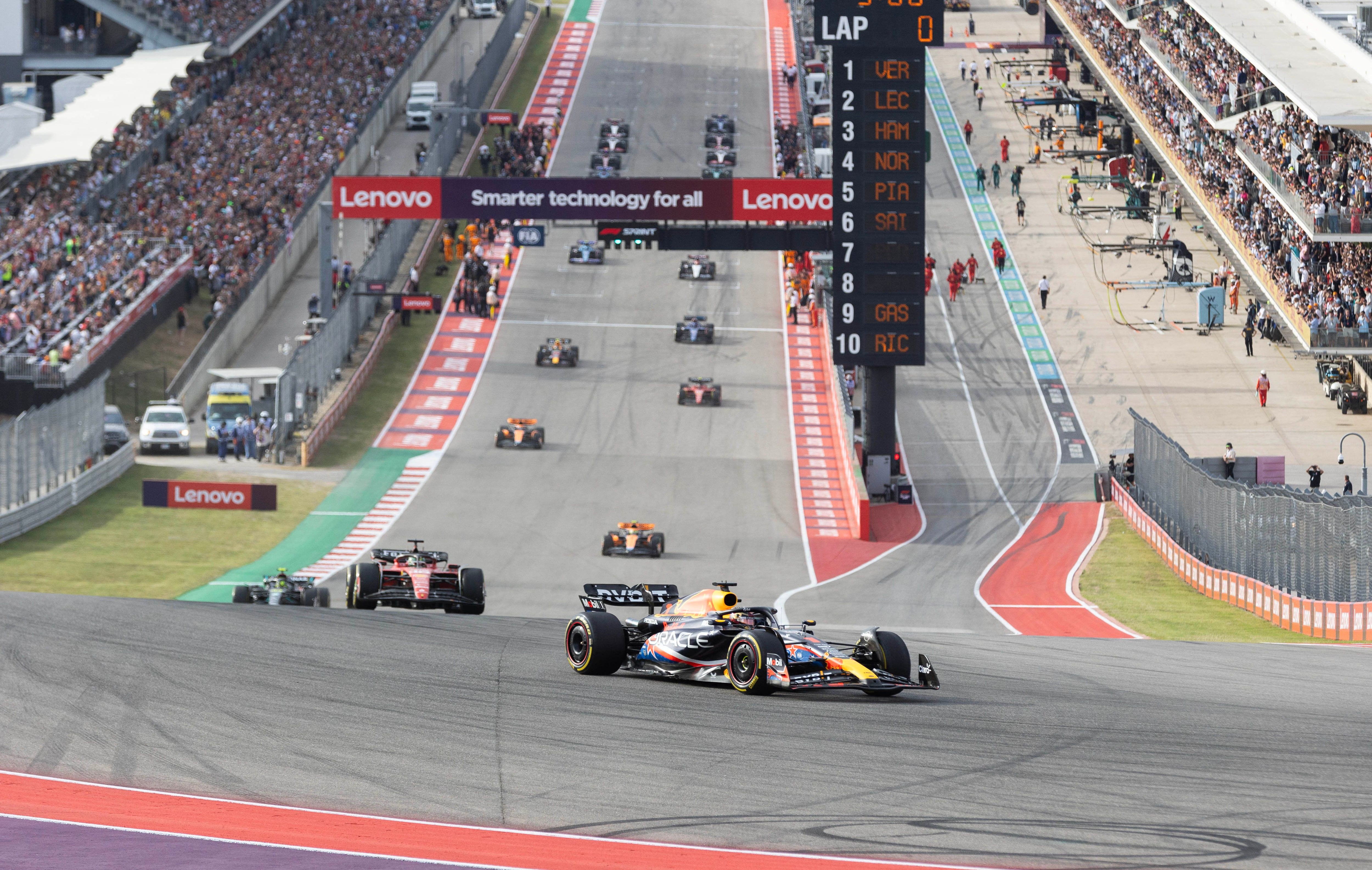 Oct 21, 2023; Austin, Texas, USA; Max Verstappen of Red Bull Racing (1) leads the pack at the start to win the Sprint Race of the 2023 United States Grand Prix at Circuit of the Americas. Mandatory Credit: Erich Schlegel-USA TODAY Sports