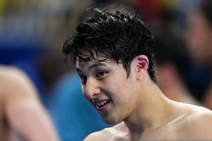 Swimming - 14th FINA World Swimming Championships (25m) - Men's 400m Individual Medley Finals - Hangzhou, China - December 15, 2018. Daiya Seto of Japan celebrates winning the race. REUTERS/Aly Song