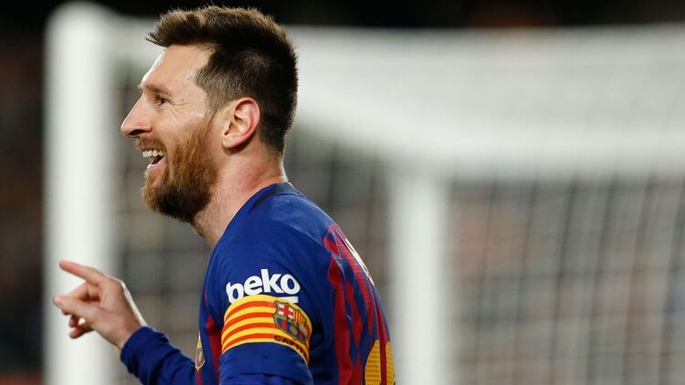 Barcelona’s Argentinian forward Lionel Messi celebrates his goal during the Spanish League football match between FC Barcelona and Levante UD at the Camp Nou stadium in Barcelona on April 27, 2019. (Photo by PAU BARRENA / AFP)