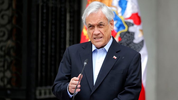 El presidente chileno Sebastián Piñera se dirige a la nación en Santiago, el 26 de octubre de 2019 (Foto de Pedro Lopez / AFP)