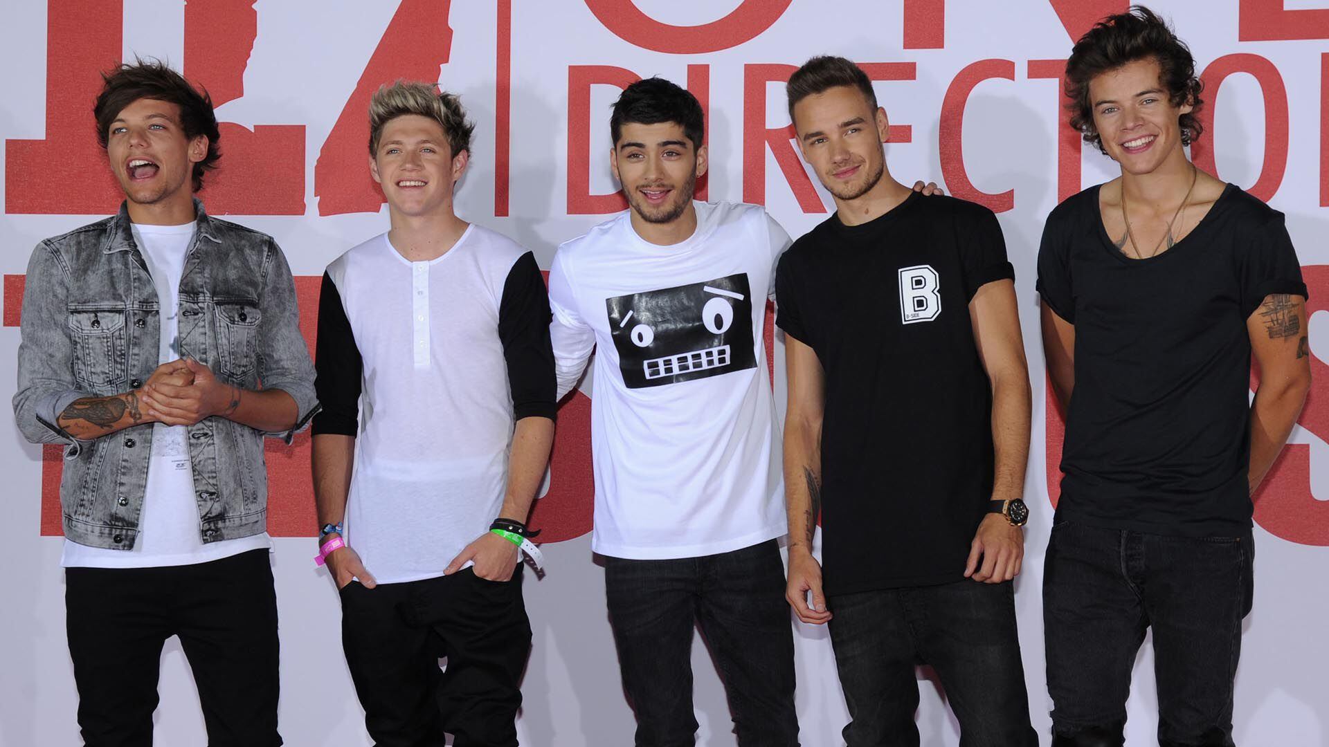 Louis Tomlinson, Niall Horan, Zayn Malik, Liam Payne y Harry Styles, integrantes de One Direction en 2013 (Crédito: Shutterstock)