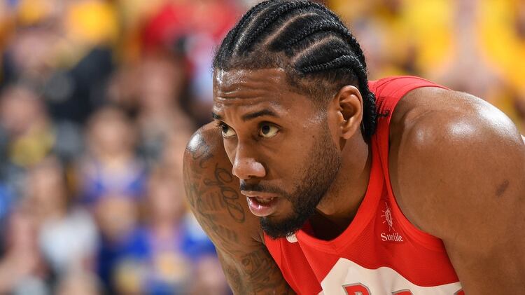 OAKLAND, CA - JUNE 13: Kawhi Leonard #2 of the Toronto Raptors looks on during Game Six of the NBA Finals against the Golden State Warriors on June 13, 2019 at ORACLE Arena in Oakland, California. NOTE TO USER: User expressly acknowledges and agrees that, by downloading and/or using this photograph, user is consenting to the terms and conditions of Getty Images License Agreement. Mandatory Copyright Notice: Copyright 2019 NBAE Andrew D. Bernstein/NBAE via Getty Images/AFP