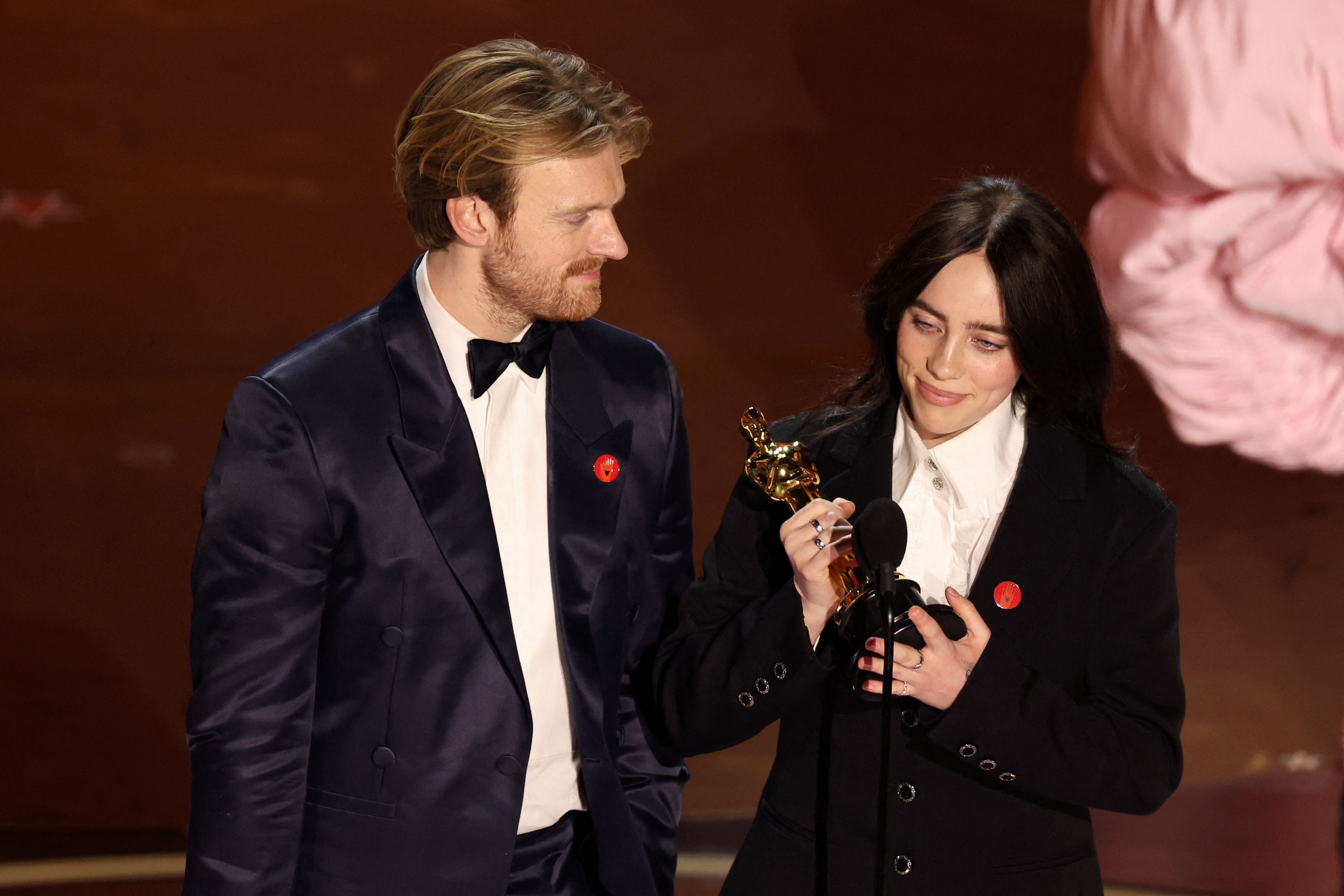 Billie Eilish and Finneas O'Connell win the Oscar for Best Original Song for "What Was I Made For?" from "Barbie" during the Oscars show at the 96th Academy Awards in Hollywood, Los Angeles, California, U.S., March 10, 2024. REUTERS/Mike Blake