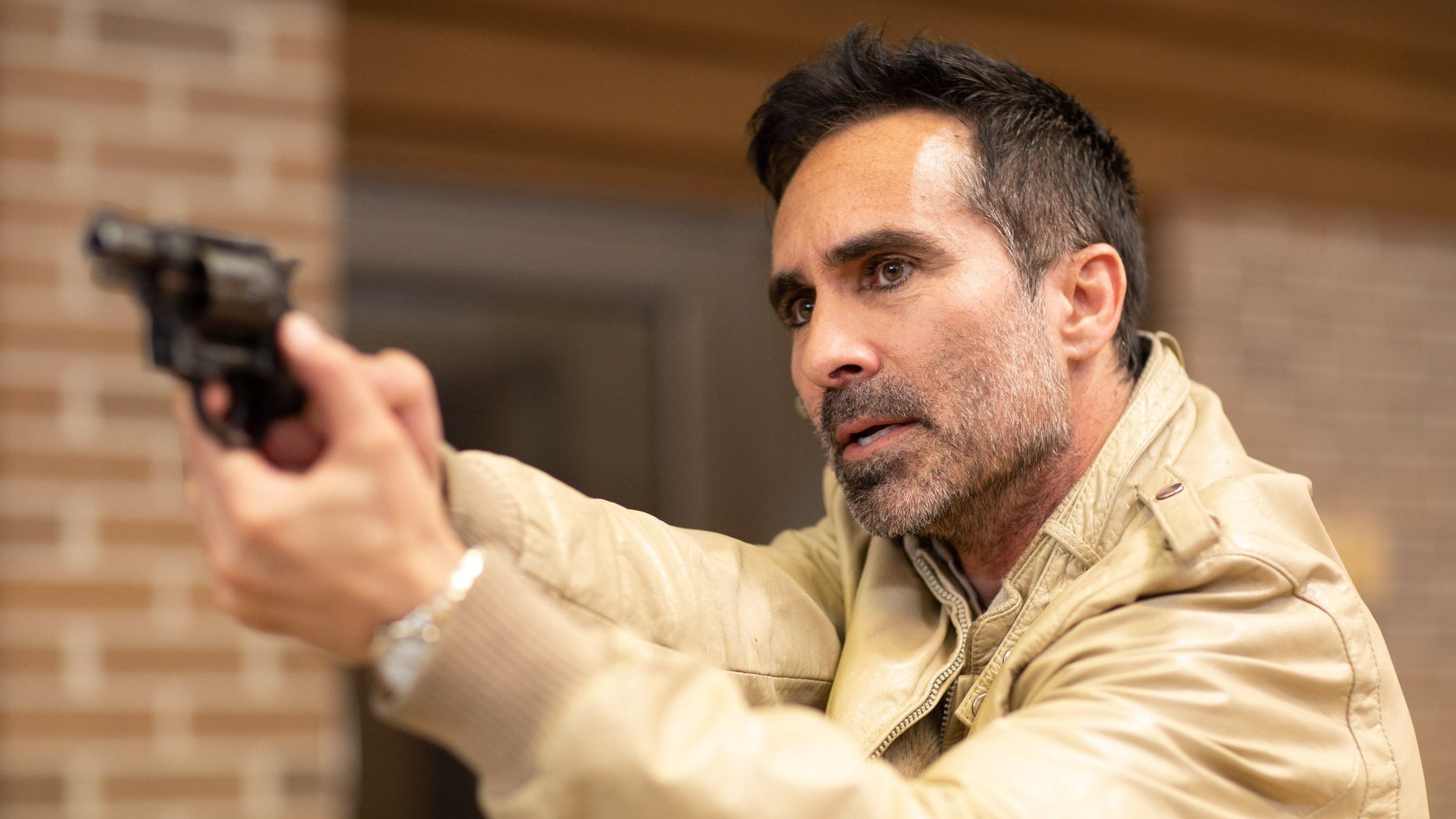 Nestor Carbonell (Batman: The Dark Knight)."He plays John Snides, the detective tracking down Galvan.  (Credits: Star+)