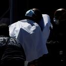 A man is taken by paramedics from a Chicago Fire Department ambulance into the emergency room at Roseland Community Hospital on the South Side of Chicago, as the coronavirus disease (COVID-19) continues to spread, in Illinois, U.S., April 21, 2020. REUTERS/Shannon Stapleton