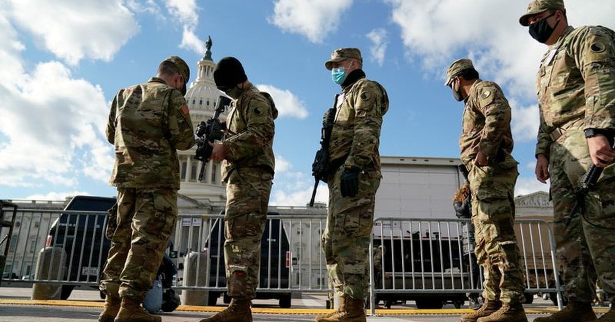 Massive security deployment seeks to shield Biden from mob threat and “lone wolves”