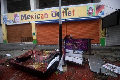 Solo se registraron postes y árboles caídos después del huracán Delta (Foto: PEDRO PARDO / AFP)