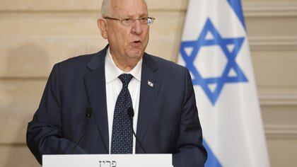 FILE PHOTO: Israel's President Reuven Rivlin speaks during a joint news conference with French President Emmanuel Macron, after a working lunch, at the Elysee Palace in Paris, France March 18, 2021. Ludovic Marin/Pool via REUTERS/File Photo