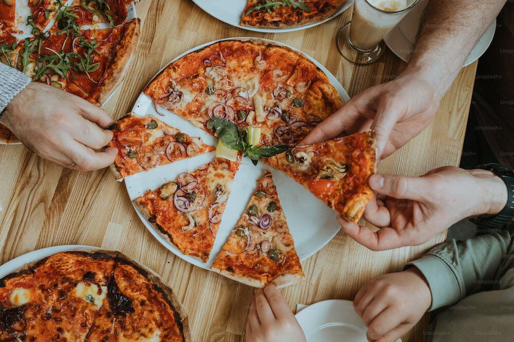 Tres pizzerías locales reconocidas en el prestigioso 50 Top Pizza USA 2023. (Crédito: Unsplash)