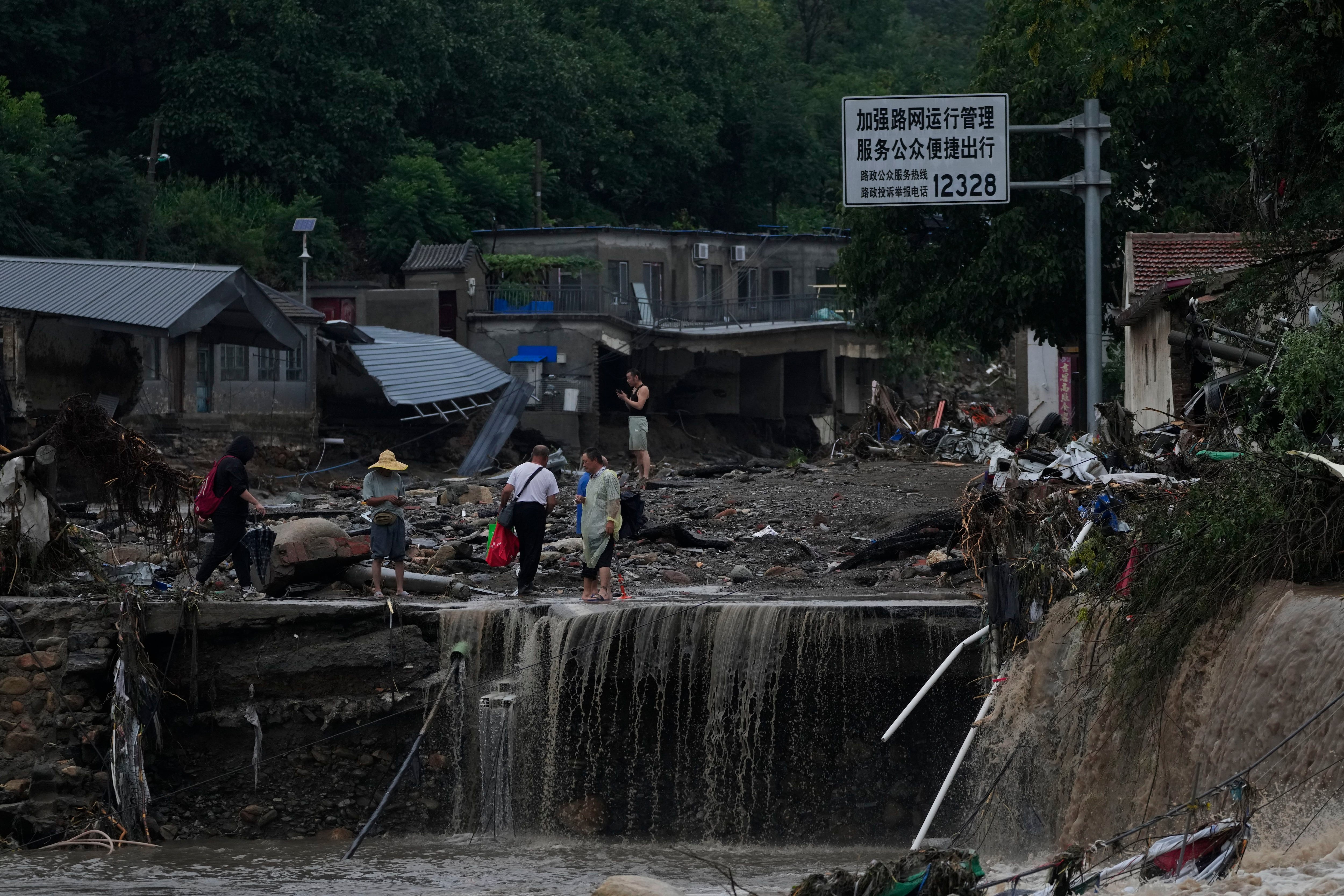 A principios de julio, al menos 15 personas murieron por las inundaciones en la región suroccidental de China. (FOTO: AP/Andy Wong)