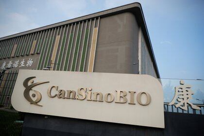 A logo of China's vaccine specialist CanSino Biologics Inc is pictured on the company's headquarters in Tianjin, following an outbreak of the coronavirus disease (COVID-19), China August 17, 2020. REUTERS/Thomas Peter