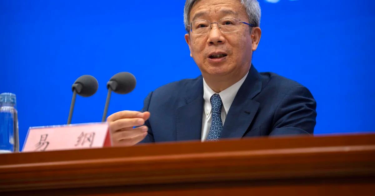 China renews term of central bank director