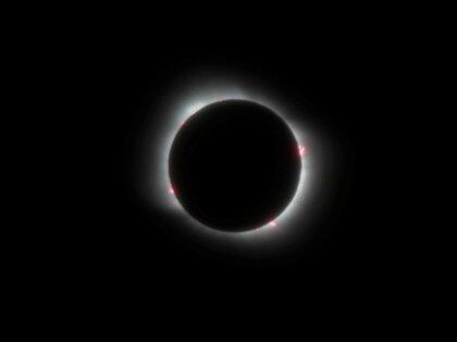 A total solar eclipse, visible in parts of Chile and Argentina, is seen in Las Grutas, in the Rio Negro province, Argentina, December 14, 2020. REUTERS/Chiwi Giambirtone. NO RESALES. NO ARCHIVES