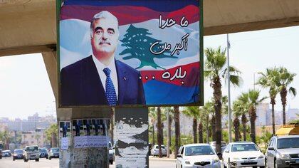 A billboard depicting Lebanon's former Prime Minister Rafik al-Hariri, who was killed in a bombing in 2005, is pictured in Sidon, southern Lebanon, Lebanon August 18, 2020. REUTERS/Aziz Taher