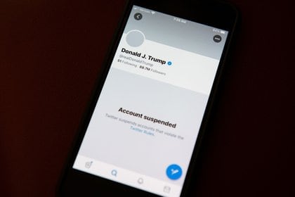 The suspended Twitter Inc. account of U.S. President Donald Trump on a smartphone arranged in Washington, D.C., on Jan. 9, 2021.