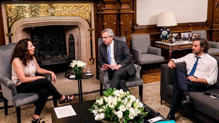 Alberto Fernández con la interventora de la AFI Cristina Caamaño 
