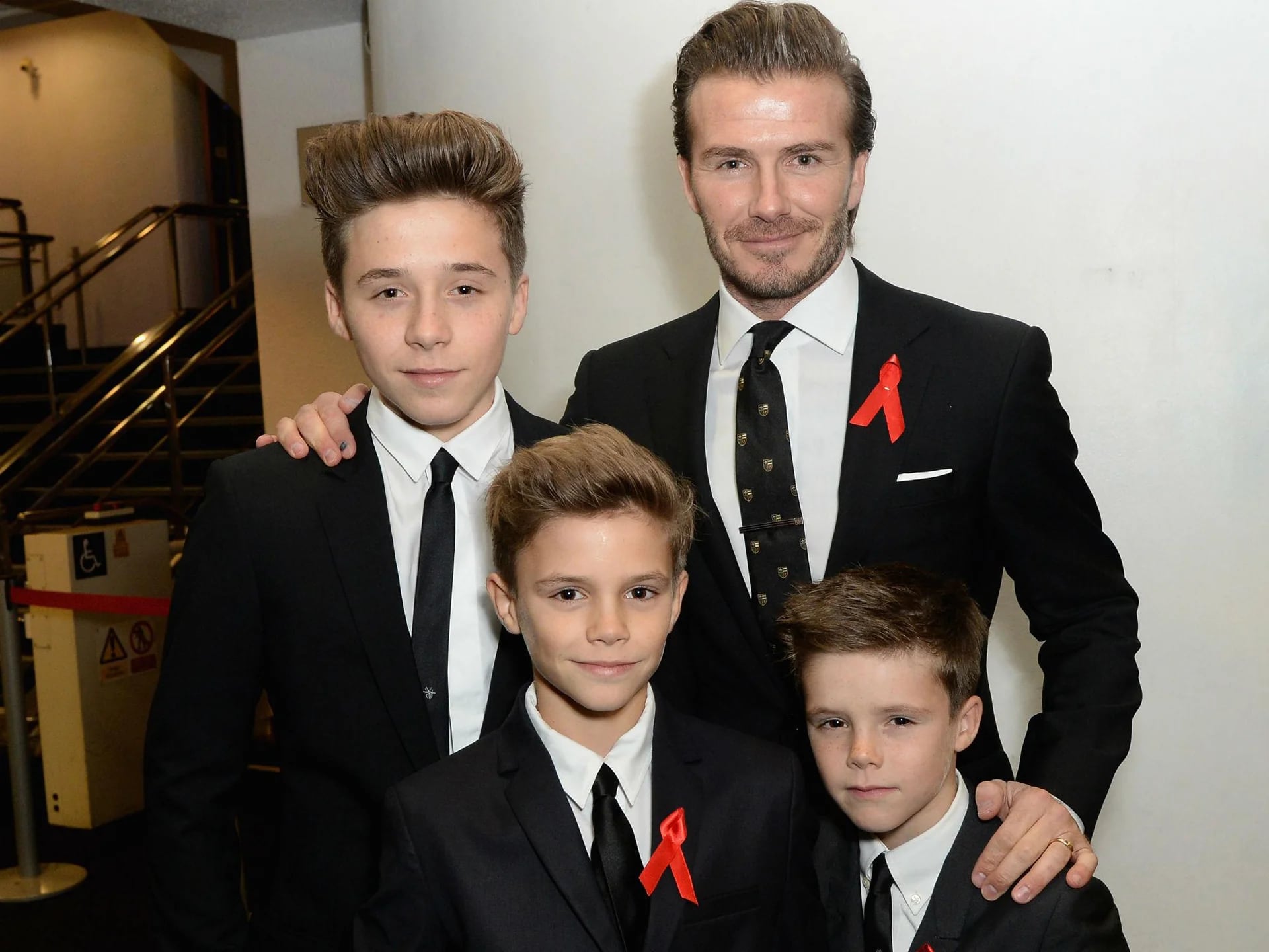 Beckham junto a sus tres hijos