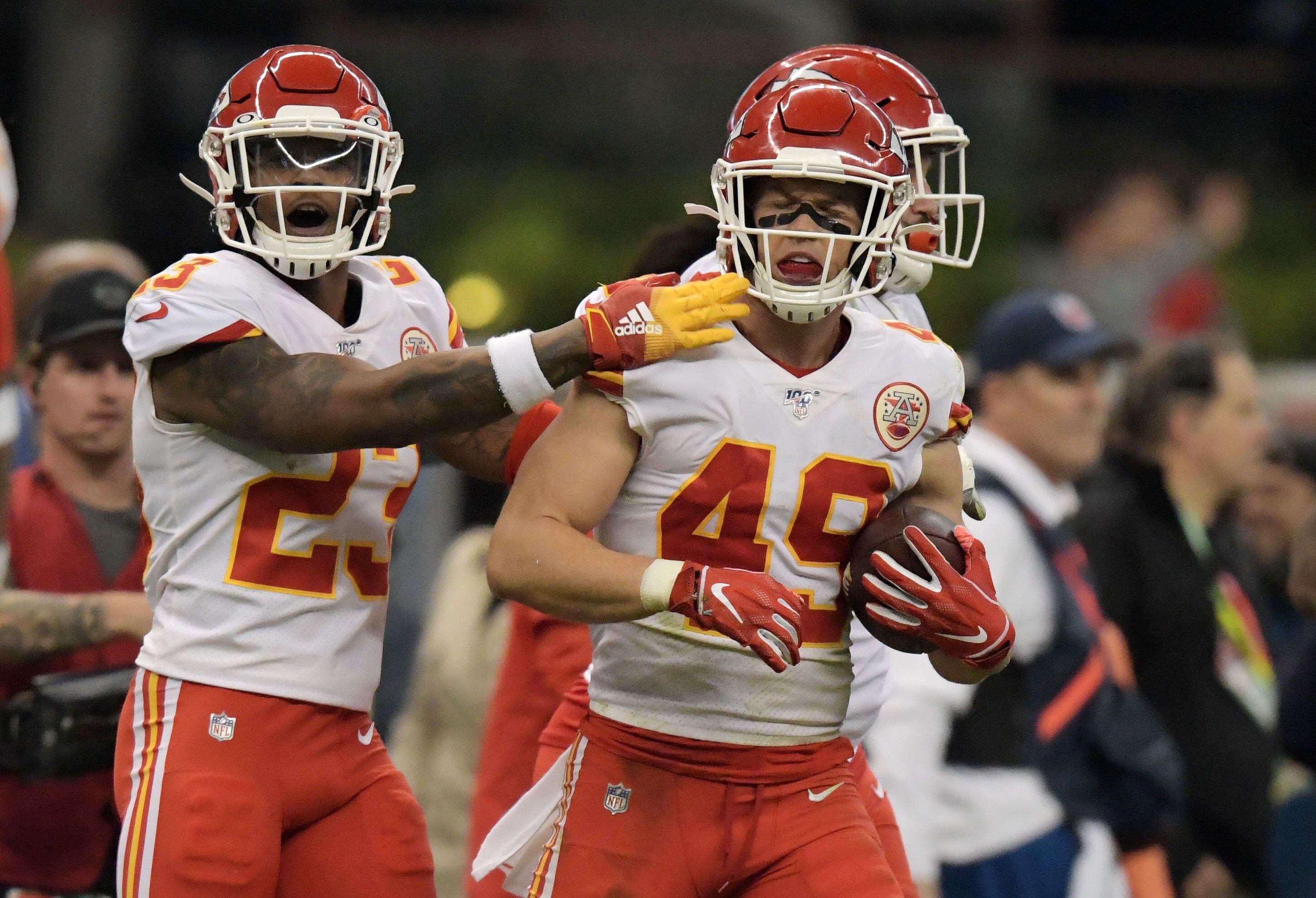 Nov 18, 2019; Mexico City, MEX;  Kansas City Chiefs defensive back Daniel Sorensen (49) celebrates with defensive back Armani Watts (23) after intercepting a pass in the final minute against the Los Angeles Chargers during an NFL International Series game at Estadio Azteca. The Chiefs defeated the Chargers 24-17. Mandatory Credit: Kirby Lee-USA TODAY Sports