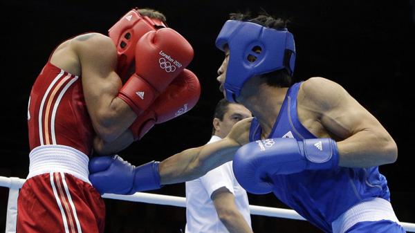 Los boxeadores profesionales podrán participar en los Juegos (AP)
