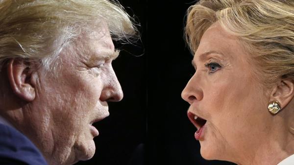 Cara a cara, dos propuestas muy diferentes: Donald Trump y Hillary Clinton (AFP)