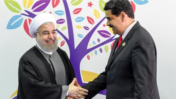 Hasan Rohani y Nicolás Maduro, líderes de Irán y Venezuela (AFP)
