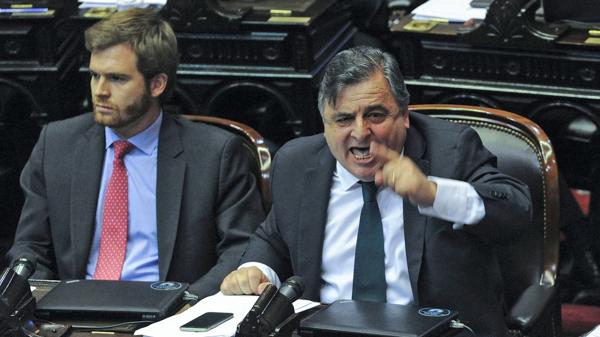 Nicolas Massot y Mario Negri (Télam)