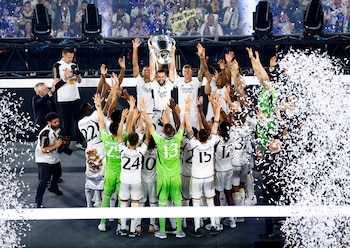 Soccer Football - Real Madrid celebrate winning the Champions League - Estadio Santiago Bernabeu, Madrid, Spain - June 2, 2024 Real Madrid's Nacho and teammates with the Champions League trophy during the celebrations with fans REUTERS/Susana Vera