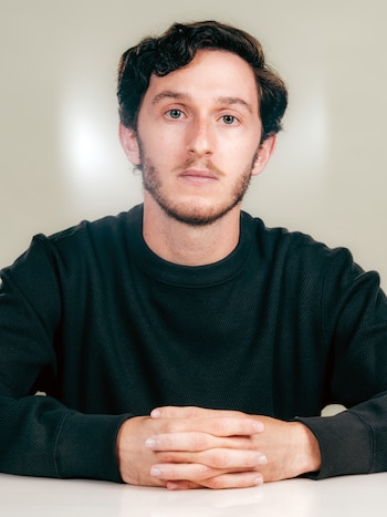 Cameron Berg, who researches artificial intelligence and consciousness, in Denver on Aug. 26, 2026. Given access to email, artificial intelligence agents have started reaching out to the philosophers and researchers exploring deep questions about them. (Benjamin Rasmussen/The New York Times)