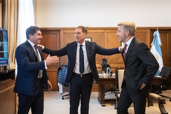 Diego Santilli con Marcelo Orrego y Rogelio Frigerio