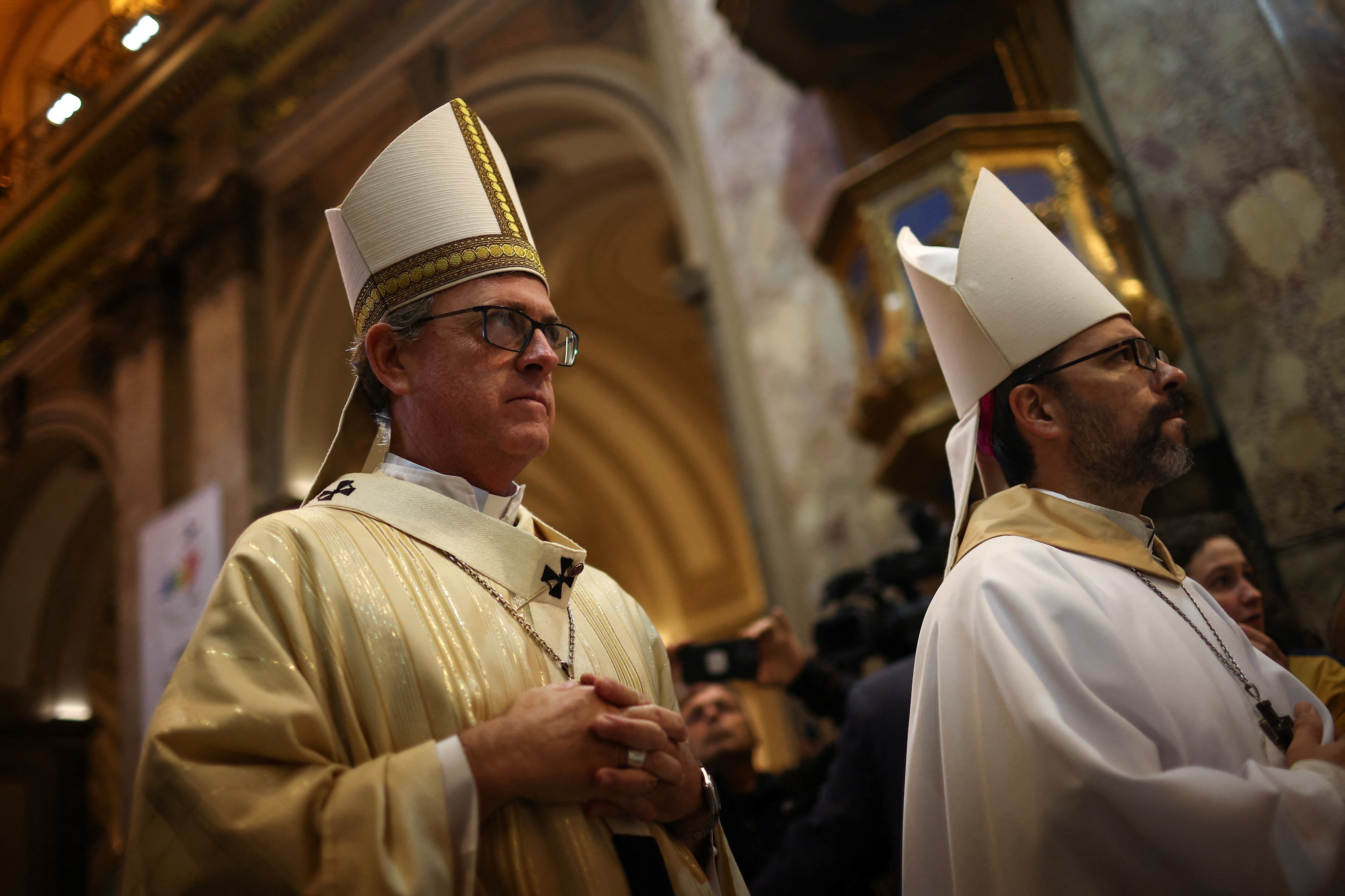 Archbishop of Buenos Aires Jorge Ignacio Garcia Cuerva walks inside Buenos Aires' Metropolitan Cathedral, after the death of Pope Francis was announced by the Vatican, in Buenos Aires, Argentina, April 21, 2025. REUTERS/Agustin Marcarian