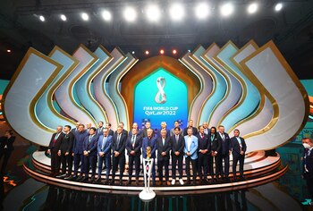 Soccer Football - World Cup - Final Draw - Doha Exhibition & Convention Center, Doha, Qatar - April 1, 2022 Coaches of the 2022 World Cup pose for a photo during the draw REUTERS/Pawel Kopczynski