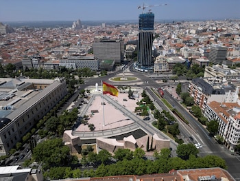 A drone view shows a Spanish flag at Plaza de Colon during general elections in Madrid, Spain July 23, 2023. REUTERS/Guillermo Martinez