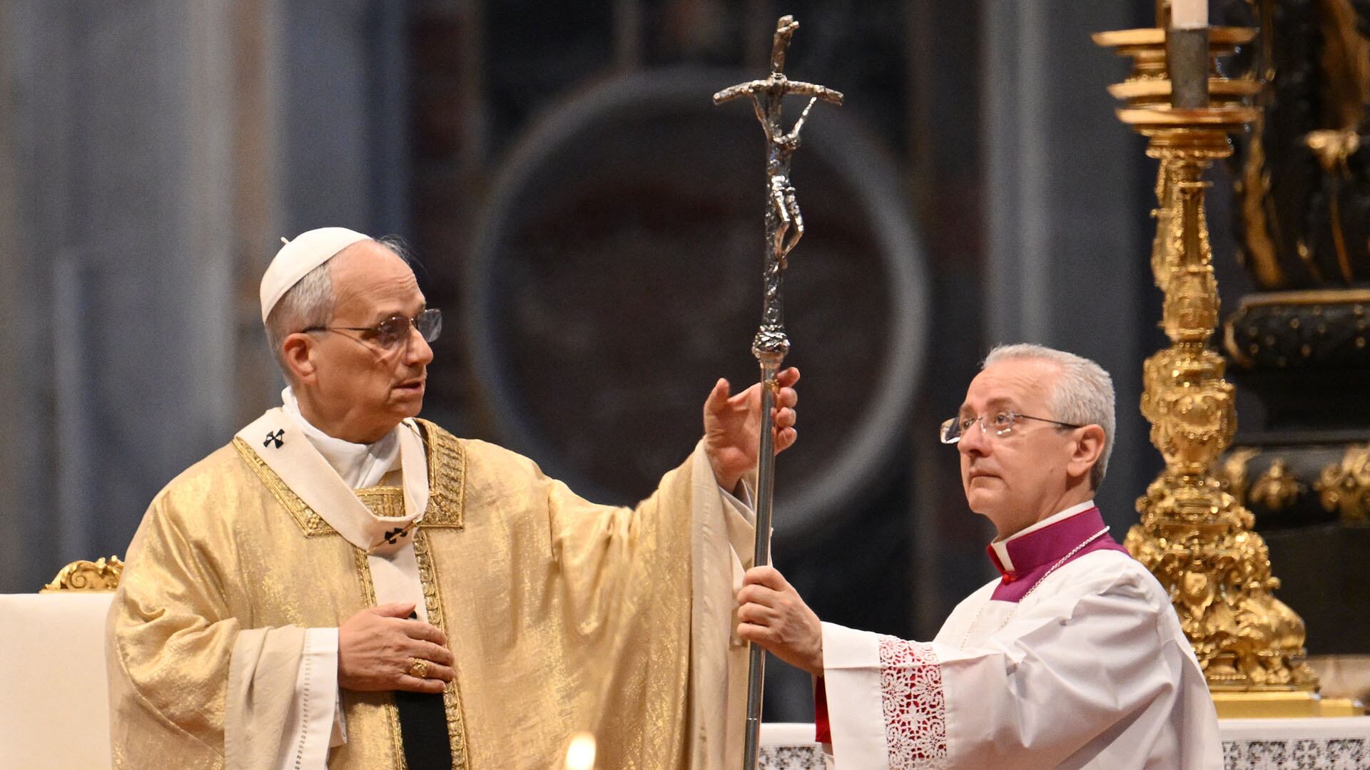 Pope Leo XIV (L) celebrates the mass with priestly ordinations at St. Peter