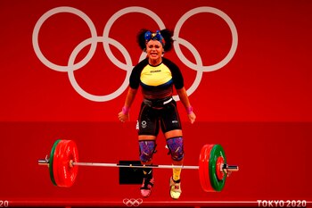 Ecuadorian weightlifter Neisi Dajomes was recorded last Sunday as she competed, wearing different colored shoes, in the final of the women's 76 kg weightlifting category at the Olympic Games in Tokyo (Japan). EFE/Fazry Ismail