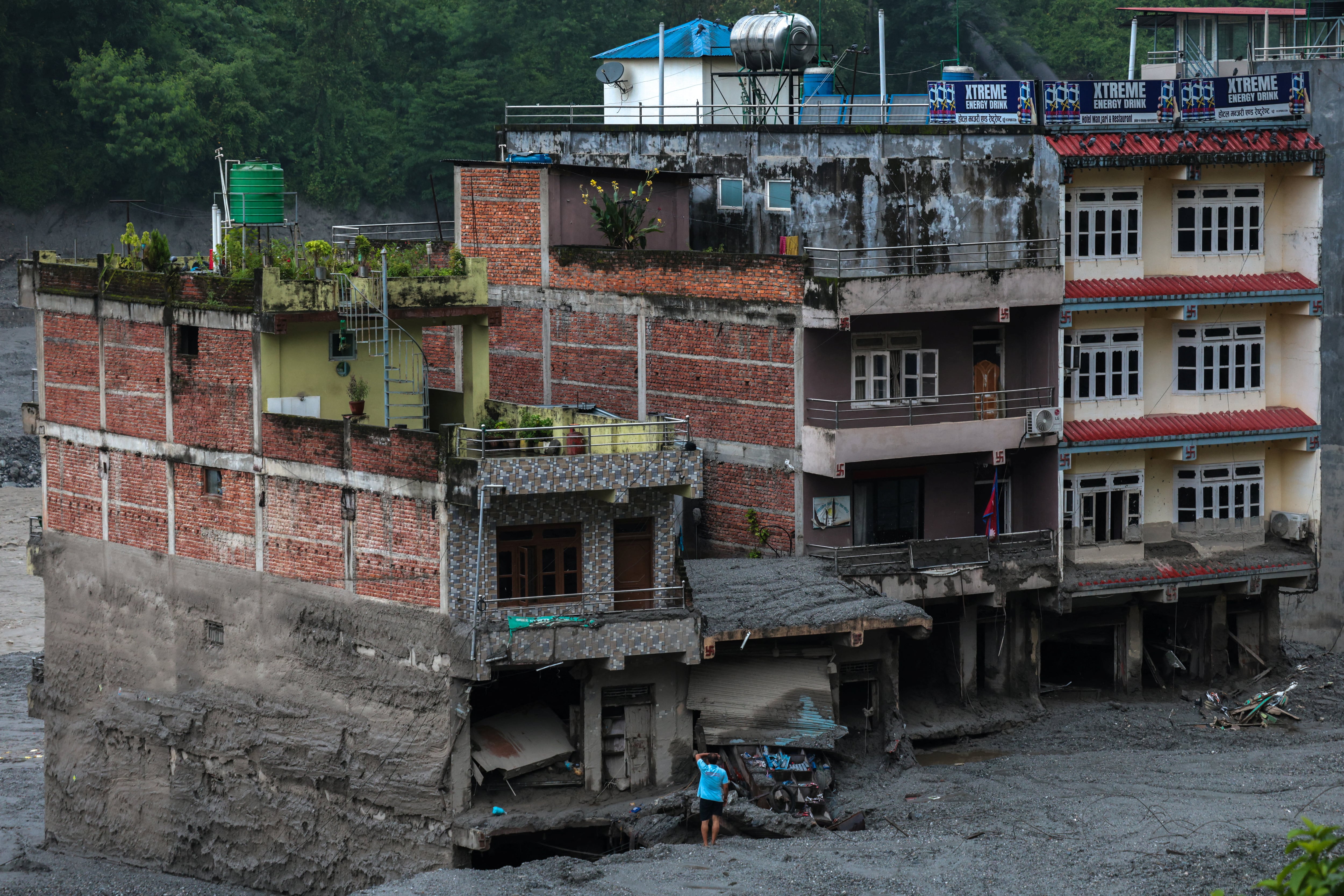 Edificios dañados tras el aluvión en Trishuli, distrito de Nuwakot, Nepal. 29 agosto 2026. REUTERS/Athit Perawongmetha