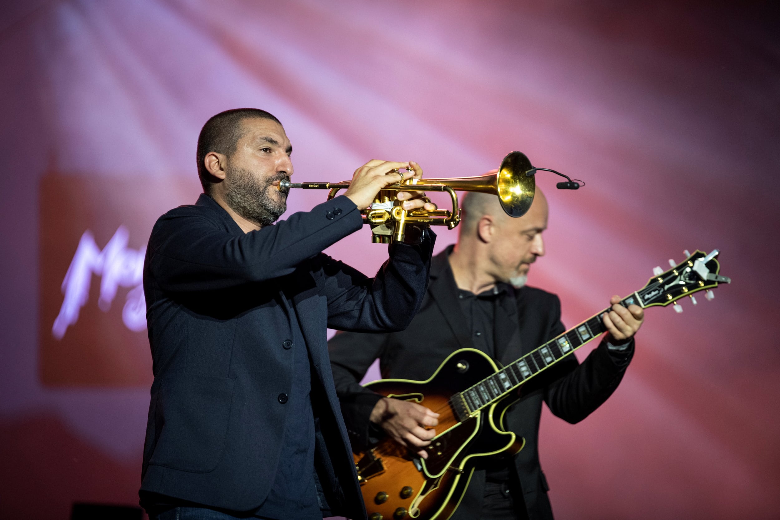 French-Lebanese trumpeter Ibrahim Maalouf and Belgian guitar player Francois Delporte perform for a limited number of fans due to the coronavirus disease (COVID-19) pandemic during the 55th Montreux Jazz Festival in Montreux, Switzerland July 5, 2021. FFJM 2021 Marc Ducrest/Handout via REUTERS. THIS IMAGE HAS BEEN SUPPLIED BY A THIRD PARTY