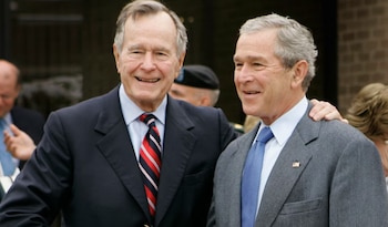 George Herbert Walker Bush y George W. Bush.