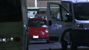 En los asientos traseros del