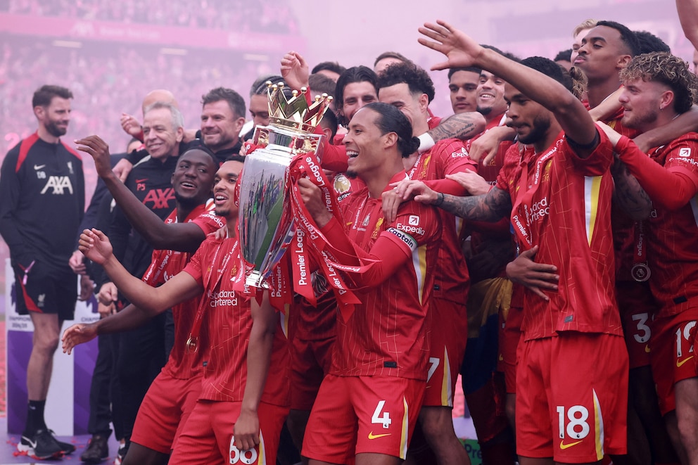 Luis Diaz celebrating with the Premier League trophy