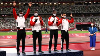 Tokyo 2020 Olympics - Athletics - Men's 4 x 100m Relay - Medal Ceremony - Olympic Stadium, Tokyo, Japan - August 7, 2021. Bronze medallists Aaron Brown of Canada, Jerome Blake of Canada, Brendon Rodney of Canada, and Andre De Grasse of Canada celebrate on the podium as they all wear protective face masks REUTERS/Andrew Boyers