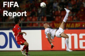Bangkok, THAILAND: Iraqi defender Jassim Mohammed Gholam (R) executes a bicycle kick as Vietnamese player Le Cong Vinh looks on during the Asian Football Cup's quarter final at the Ratchamangla Stadium in Bangkok, 21 July 2007. Iraq is leading by 1-0 at the end of the first half of play against Vietnam. AFP PHOTO / Saeed KHAN (Photo credit should read SAEED KHAN/AFP/Getty Images)