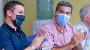 Oestmann junto al ex gobernador,