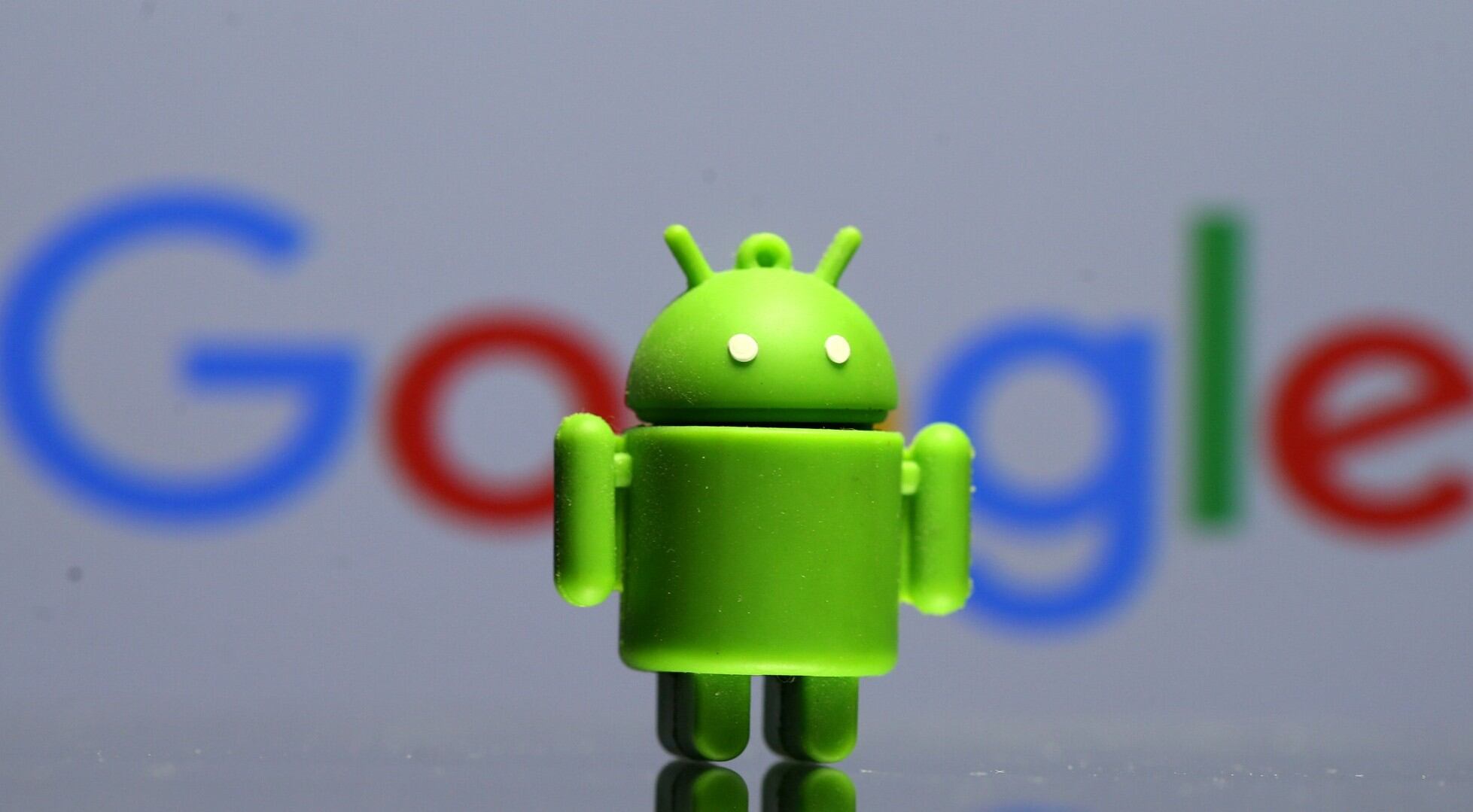 FILE PHOTO - A 3D printed Android mascot Bugdroid is seen in front of a Google logo in this illustration taken July 9, 2017. Picture taken July 9, 2017. REUTERS/Dado Ruvic/Illustration/r/File Photo