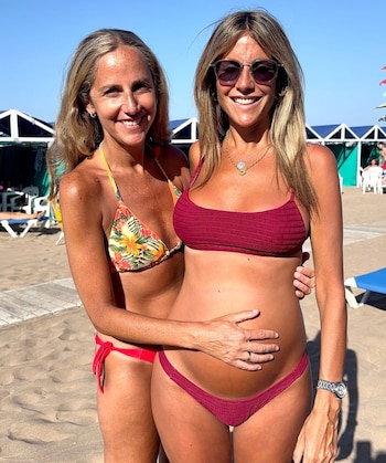 Belén Ludueña junto con su