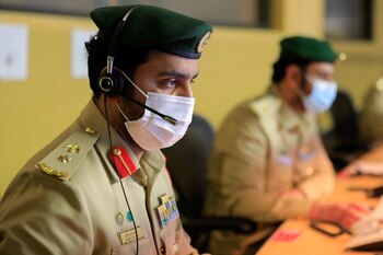 Emirates police officers work on