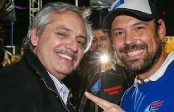 Junto al Presidente, en una