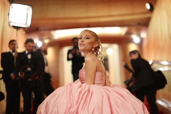 Ariana Grande poses on the