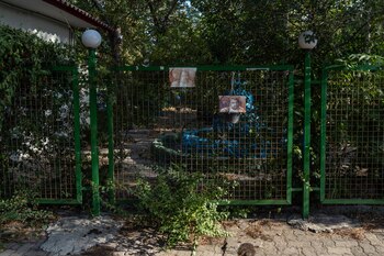 Pictures of Babak Khorramdin near the buidling where he used to live with his parents, Akbar Khorramdin and Iran Mousavi, in Tehran on July 2, 2021. The couple has confessed to murdering and dismembering their son, years after killing a daughter and her husband. (The New York Times)