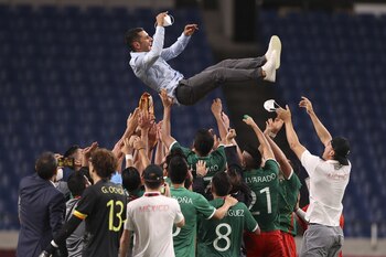 Jaime Lozano y sus jugadores